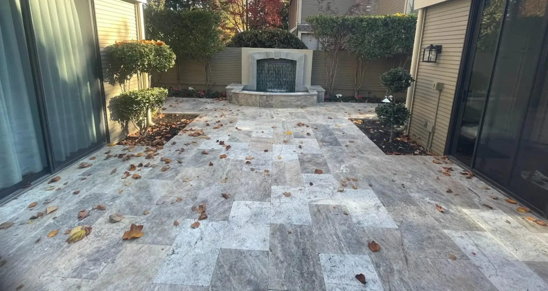 Paver patio and water feature showcasing hardscape design in Loomis, CA.