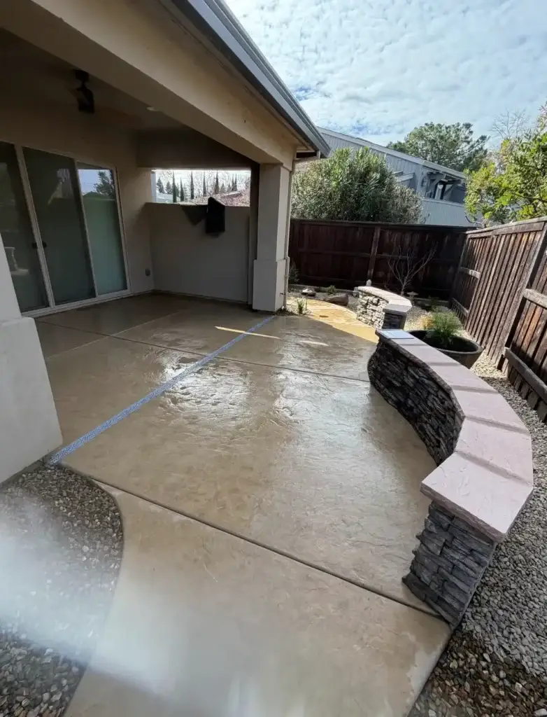 Stamped concrete patio and retaining wall landscaping project in Loomis, CA