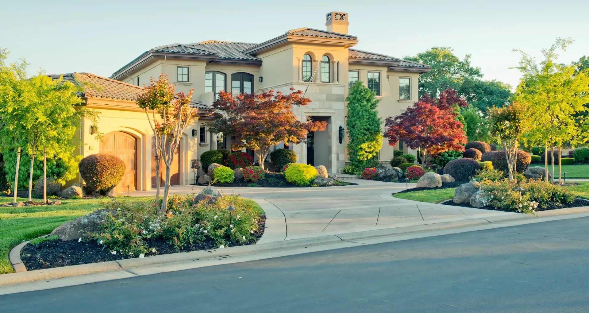 Concrete driveway installation and landscape design enhancing property value in Loomis, CA.